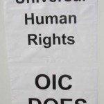 R.E.A.L. Protest Sign: "We Support Universal Human Rights, the OIC Does Not"