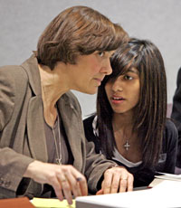 Columbus, Ohio - Rifqa Bary (right) talks to attorney Angela M. Lloyd (left) at December 22 hearing (Columbus Dispatch / Tom Dodge)