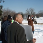 Damanga's Mohamed Yahya Speaks into Megaphone at Capitol Rally