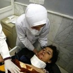 iraq_christian_woman_wounded A wounded Iraqi woman receives medical care at a hospital in the northern Iraqi city of Mosul, after a double bomb attack targeting buses carrying Christian students and university workers near Mosul in killed a shopkeeper and wounded 80 other people, 02 May 2010 (Photo: AFP)