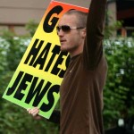 Westboro Baptist Church Hate Group Protester with Anti-Semitic Sign "God Hates Jews"