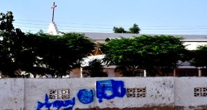 Hate Graffiti on Karachi - Taiser Town Area Church in Pakistan -- after Christian homes burned, Christians attaked, boy killed -- graffiti included calls for Christians to "convert to Islam"
