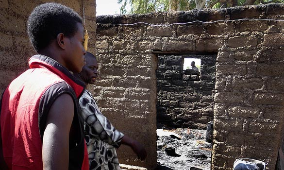 London Times: "Witnesses said that gangs waited at main entry points to the villages while others went from house to house, setting the homes on fire" (Photo: London Times)