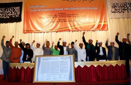 Indonesia Central Library Meeting with Flag of Extremist Caliphate and Raised Fists Against U.S. President Barack Obama