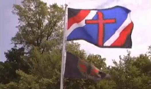 Another Hutaree Flag Over Milita Training Area (Photo: YouTube)