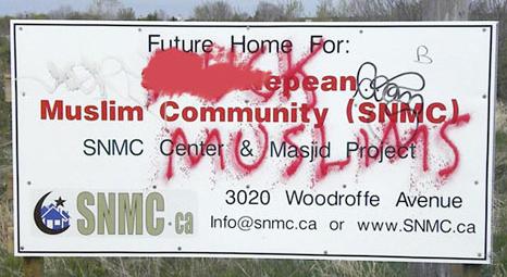 Canadian CTV: "Offensive words were spray painted on this sign located at the site of a future mosque and Muslim community centre in Barrhaven. The graffiti was discovered Friday, April 30, 2010." (Photo: CTV)