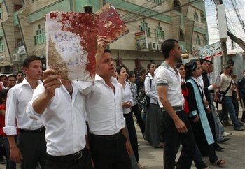 Fragments of a Blood-Stained Notebook After Targeted Bus Bomb Attack on Christians (Photo: AP)