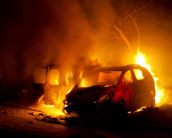 More West Bank Arson - Haaretz: "Palestinian cars torched in northern West Bank." (Photo: Gil Eliyahu)