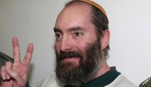 Photograph of Smiling Yaakov (Jack) Teitel in the Jerusalem District Court, January 11, 2010. (Photo: Haaretz/Ana Kaplan)