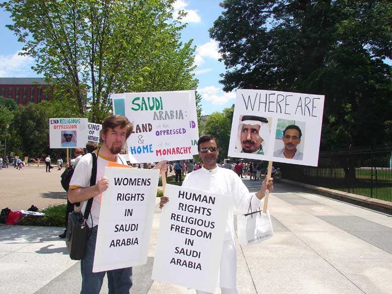Muslim Mahdi Husain (Right) of the IIC and Christian Jeffrey Imm (Left) of R.E.A.L. Picket Together for Religious and Women's Freedom in Saudi Arabia