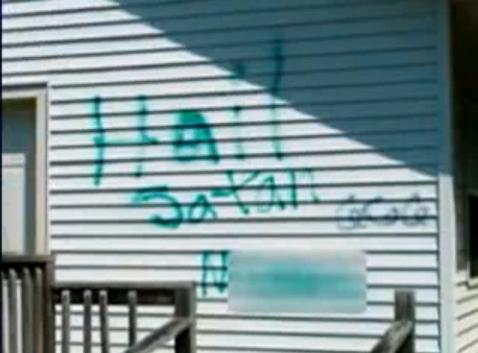 Maryland: Vandalism of Cokesbury First Baptist Church includes Satanic and Racial Slur Graffiti (Blurred) (Photo: Still from WBAL Report on YouTube)
