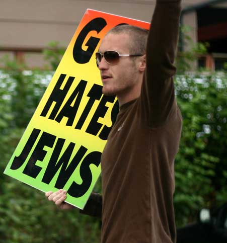 Westboro Baptist Church Hate Group Protester with Anti-Semitic Sign "God Hates Jews"