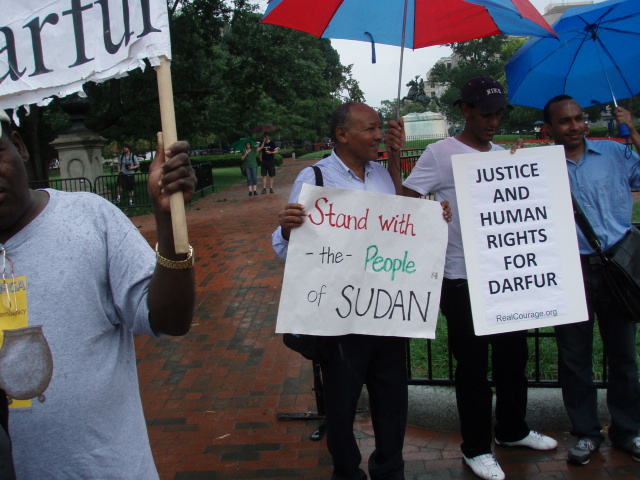 Protesters for Justice Undiscouraged by Rain