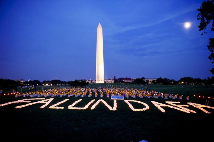 Washington DC: July 22, 2010 - Falun Dafa / Falun Gong Gather for Candlelight Vigil in Washington DC to Remember Persecution and Lives Lost  (Photo: Dai Bing/Epoch Times Staff)  