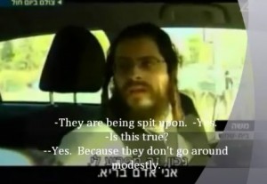 Local Man in Beit Shemesh Justifies Spitting On Little Girls (Photo Clip: YouTube / Channel 2)